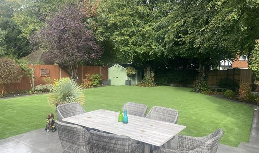 Artificial grass fitted under Lyme trees