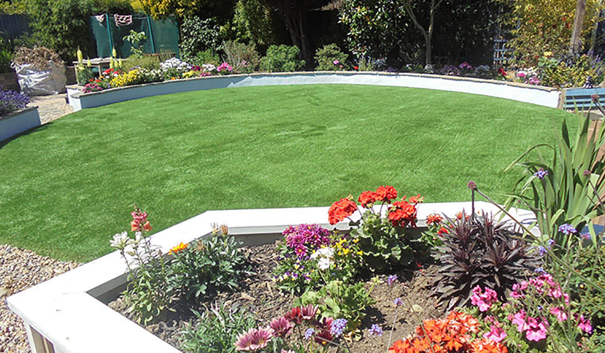 Mediterranean planting alongside artificial grass Mediterranean planting alongside artificial grass
